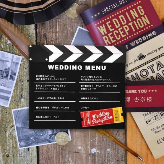 カチンコをイメージした結婚式のメニュー表