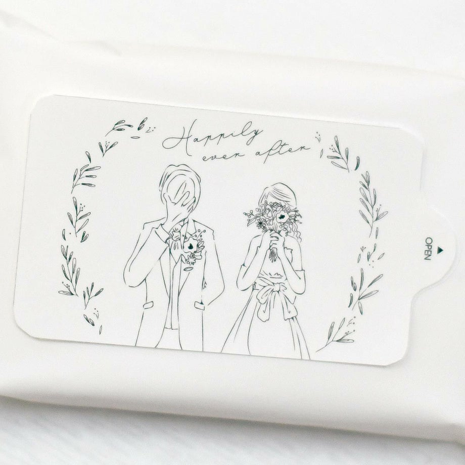 フラップ部分に新郎新婦の線画イラストがあしらわれたおしゃれなアルコール除菌ティッシュ